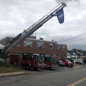 9/11 Remembrance Flag Fliers Over Apparatus